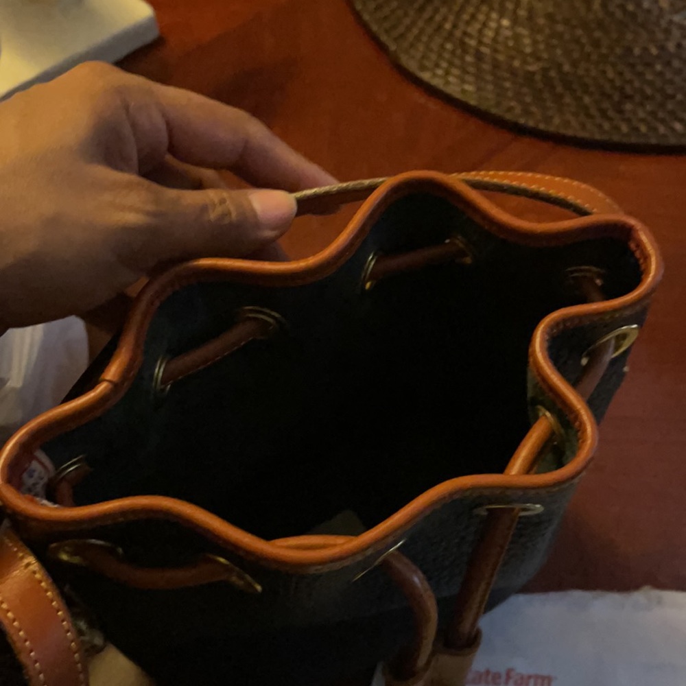 Dooney & Bourke Navy and Tan Pebbled Leather Drawstring Crossbody - Picture 7 of 9